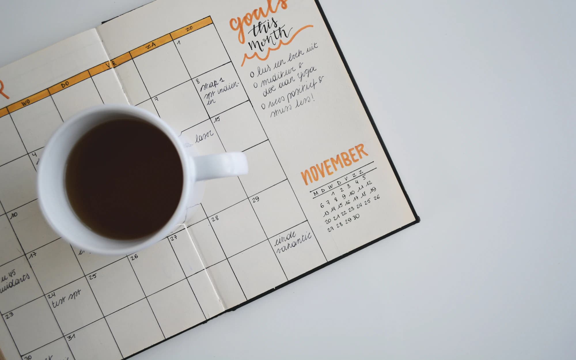 A planner and calendar prepared for the week ahead